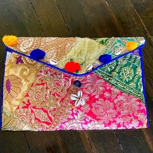 Gold pink blue clutch